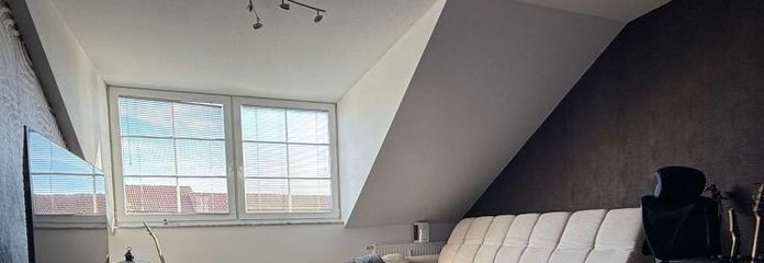 Sonnige Dachgeschosswohnung im Reihenendhaus