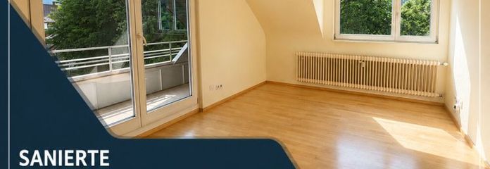 Appartement mansardé central de 2 pièces avec balcon