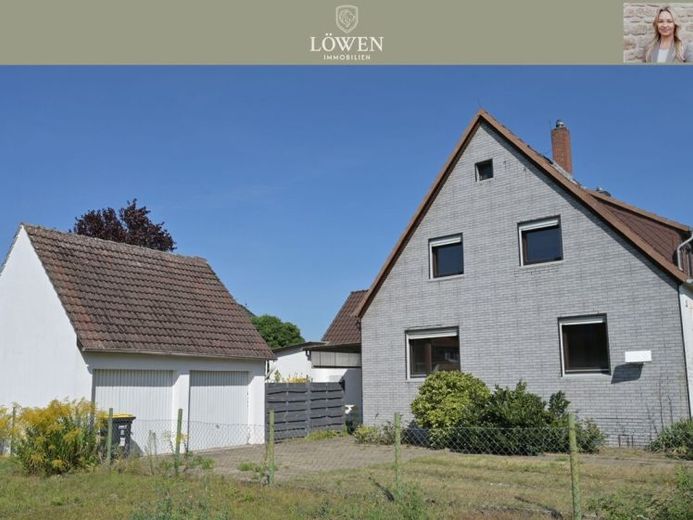 Charmante Doppelhaushälfte auf wunderschönem Gartengrundstück in Weddel – Foto 1