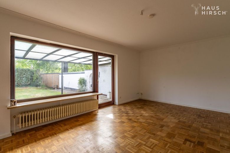 Doppelhaushälfte mit 5 Zimmern auf 133 m² in Boostedt zu kaufen – Wohnzimmer / Terrasse