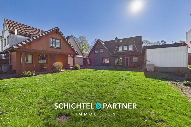 Woltmershausen | Familienhaus mit Carport &amp; großem Südwest-Garten – S&amp;P | Titelbild