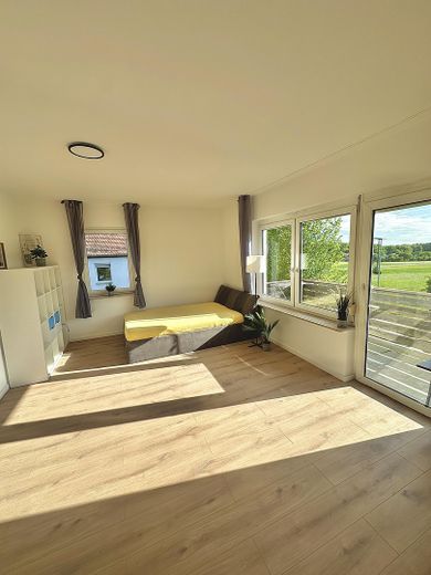 Zimmer mit Balkon