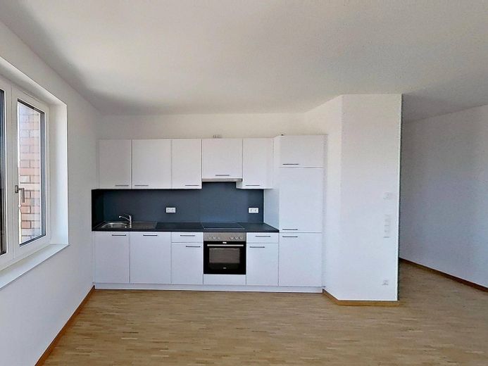 *1 NKM sparen bei Einzug* Modernes Wohnen in Kronsrode: 2-Zimmer-Wohnung mit EINBAUKÜCHE, LOGGIA und BALKON – Ansicht IV: Wohn- und Esszimm…
