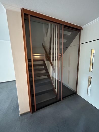 Commission-free terraced house living area 150sqm plot 230sqm Kattenesch – Wohnzimmer Glasschiebetür 