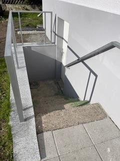 624 m² Grundstück mit Entwicklungspotenzial – modernisiertes Einfamilienhaus in Lorsch – Außentreppe Keller Gartenzugan