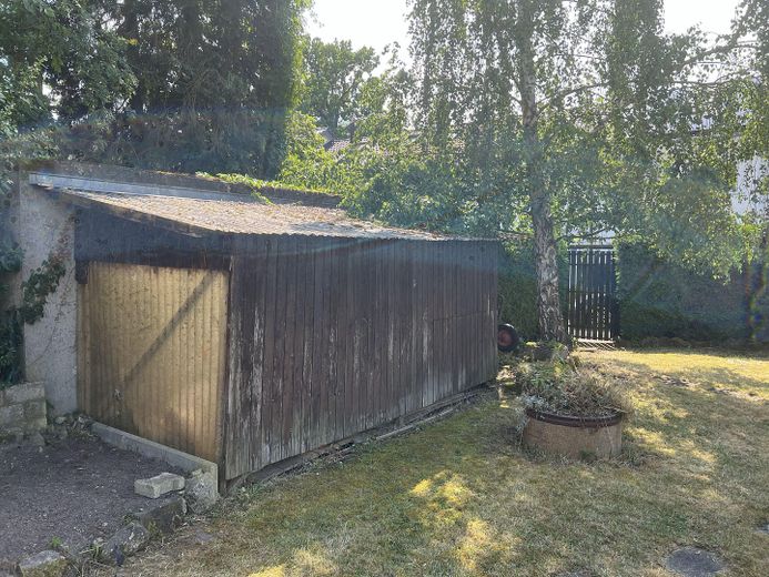 Charmantes Reihenhaus mit ausgebautem Dachboden und schönem Außenbereich - zzgl. Garage – Gartenhaus