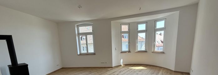 Wohn-/Esszimmer mit Ofen