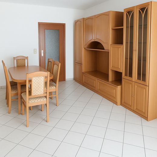 Exklusive 3-Zimmer-Penthousewohnung mit 36 m² Dachterrasse und zwei Stellplätzen – Wohnzimmer - Essplatz