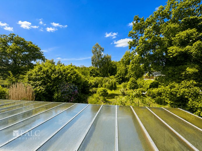 Gartenidylle mit Wintergarten-charmantes Einfamilienhaus zum Wohlfühlen in der Nähe von Langen – Aussicht zur Rückseite des Hauses (über dem Wintergarten)