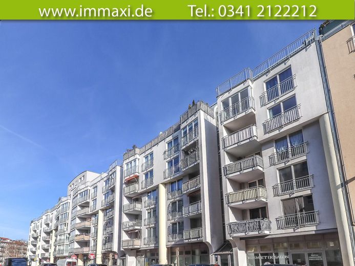 MAISONETTE IM DACHGESCHOSS + 2,5 RAUM VERMIETET + 2 TIEFGARAGENPLÄTZE – Hausansicht
