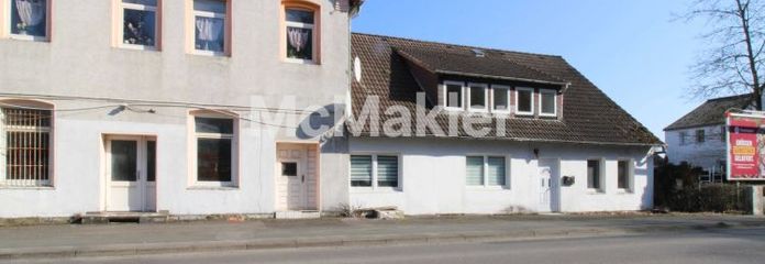 Casa residenziale e commerciale (5WE, 2GE, 10 posti auto) in procedura di offerta