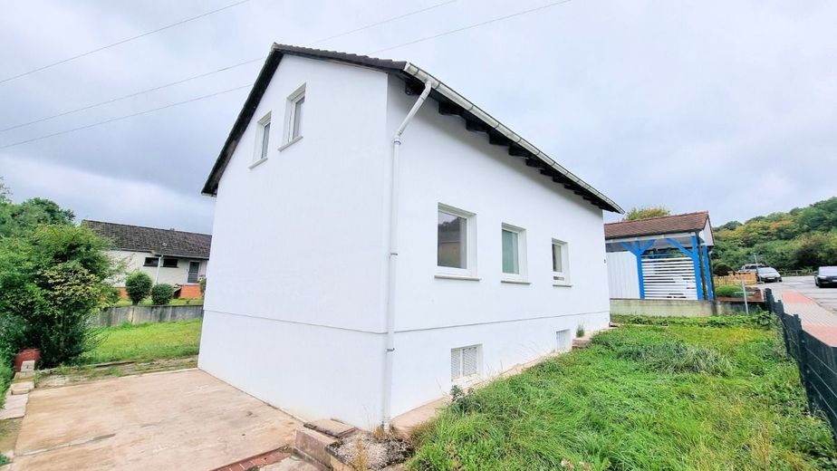 1-Familienwohnhaus in ruhiger Wohnlage – Asnicht Garten - Heise Immobilien Holzminden