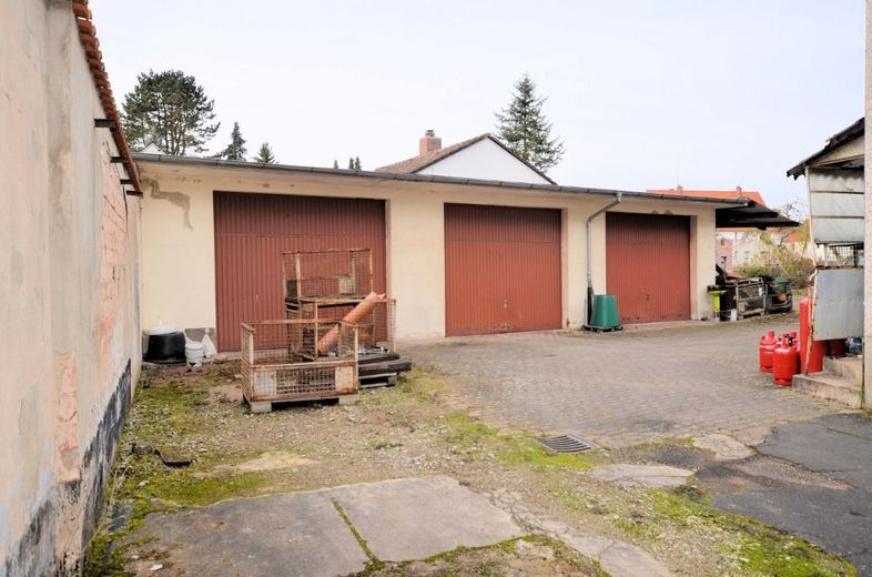 ** PREISREDUZIERUNG ** Wohn- und Geschäftshaus mit Gaststätte, Wohnung und Garagen in zentraler Lage – Wohn- und Geschäftshaus - Dassel - Heise Immobilien