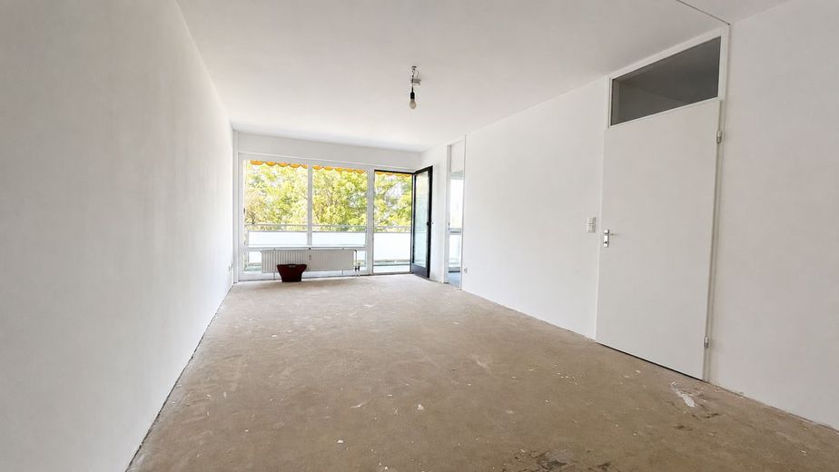 Kapitalanlage mit Seltenheitswert: Appartement mit Balkon, Indoor-Pool und Garten in Wi-Sonnenberg – Wohnbereich