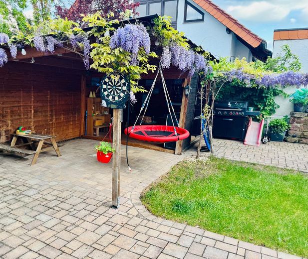 Casa unifamiliare ben tenuta in posizione periferica a Ludwigshafen Ruchheim – Garten