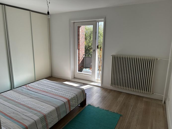 SZ OG mit Balkon + Gartenblick