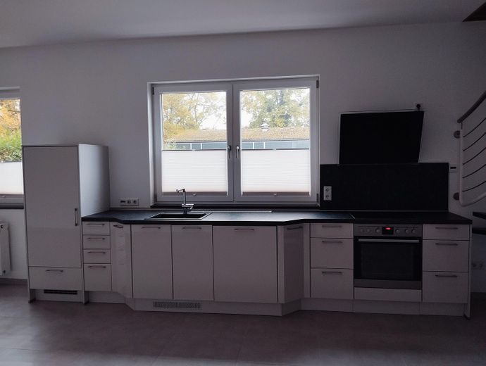Attraktive 3-Zimmer-Loft-Wohnung mit Garten in Hilden – neuwertige Einbauküche
