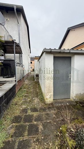 *** Kapitalanlage: Dreifamilienhaus mit stabilen Mieteinnahmen in Lampertheim *** – Hintereingang Garten
