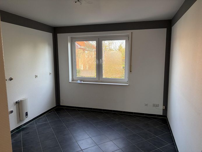 Großzügige Maisonette-Wohnungmit Balkon und eigenem Garten – Hauswirtschaftsraum