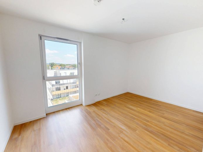 Moderniteit en comfort: nieuwbouwappartement met 4 kamers, inbouwkeuken en groot dakterras – Ansicht I: Schlafzimmer II