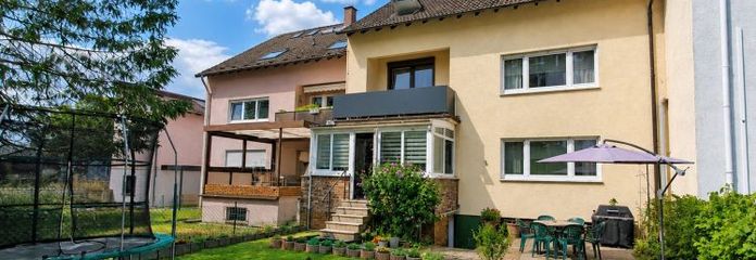 Erdgeschosswohnung mit Wintergarten und Garten