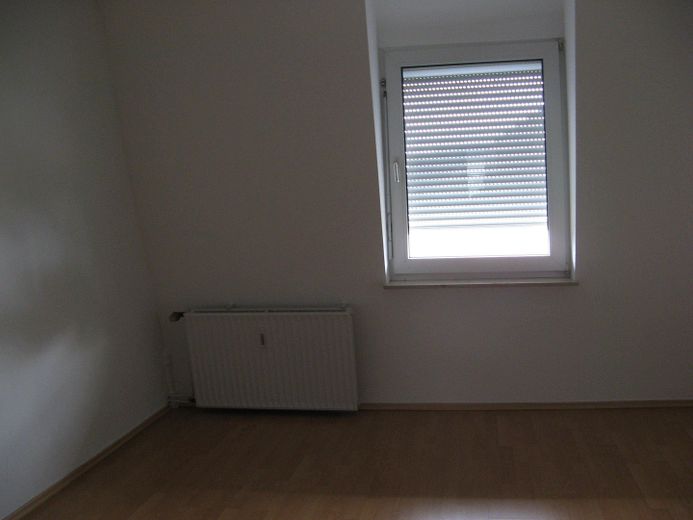 Charmante Altbauwohnung mit Garten im Herzen der Stadt – Schlafzimmer