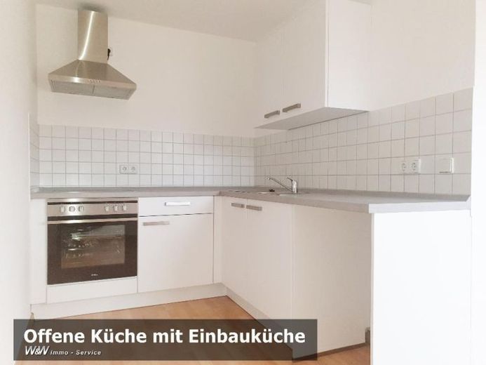 Wohnung mit Einbauküche im Zentrum sucht Sie! – Foto 1