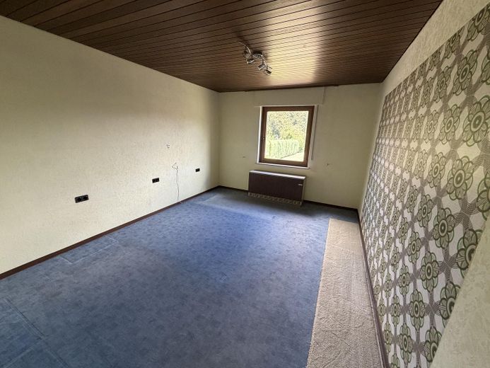 Löhne-Mennighüffen’de büyük bahçeli tek- veya iki ailelik ev – Schlafzimmer 2 EG