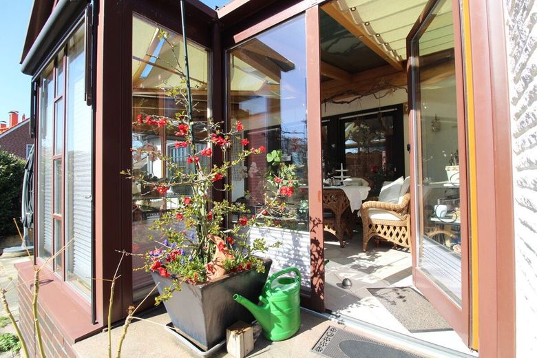 Individuelles, ruhiges Einfamilienhaus mit Einliegerwohnung, Wintergarten, Kamin, Vollkeller&amp; Garage – 14 - Wintergarten mit Zugang zum Garten