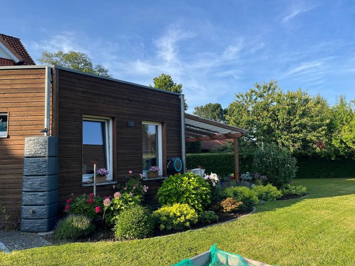 Charming end-terrace house with generous plot in Kaltenkirchen – Anbau Wohnzimmerseite