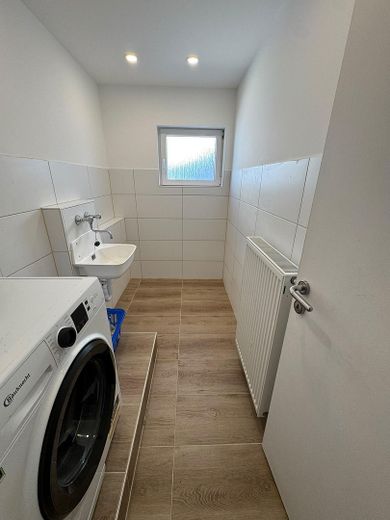 Freistehendes Einfamilienhaus mit viel Platz für Familie, Alltag und Zukunft – Hauswirtschaftsraum 1. OG