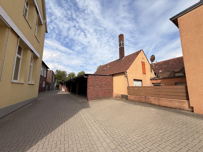 Wohn- und Geschäftshaus mit Ladenfläche, Nebengebäude, Garagen&Ausbaupotenzial in Nordkirchen-VHB – Hausrückseite