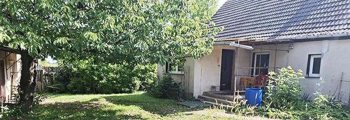 Wustrow/Oderbruch’da komisyonsuz, konutlu ev ve ahırı bulunan ada konumundaki çiftlik satılıktır – Hausansicht vom Innenhof