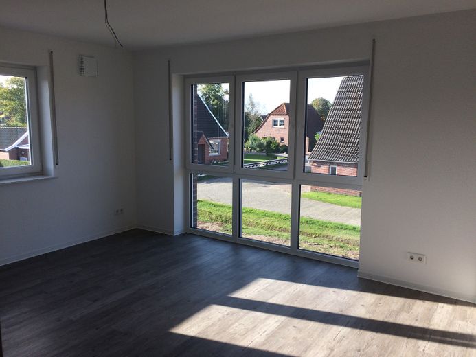 Appartamento vicino al centro a Moordorf – Wohnzimmer