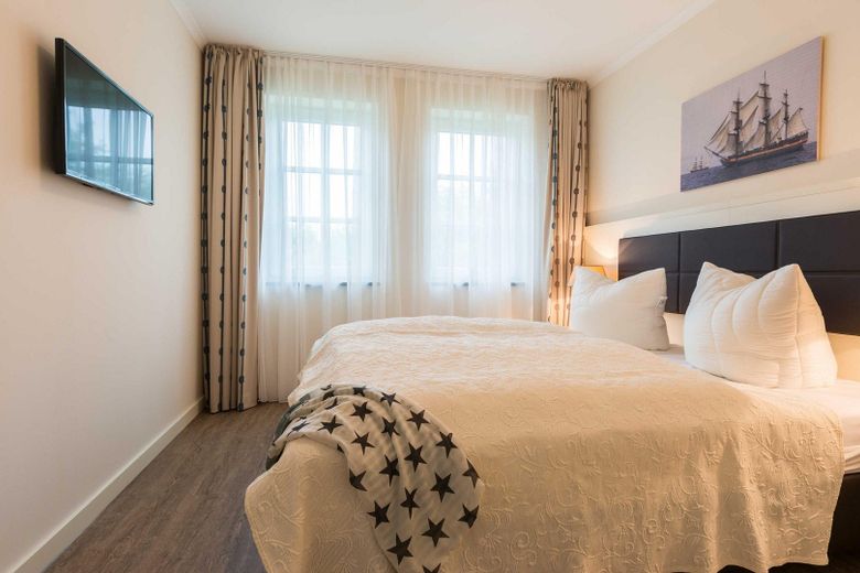 Well-maintained holiday apartment *only 200m to the beach* – Schlafzimmer gross