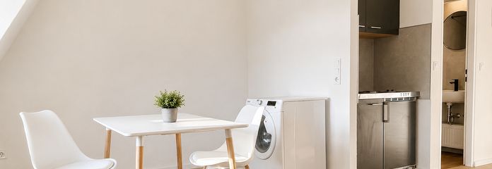 6,3 % Rendite! Umfassend renovierte Eigentumswohnung mit Stellplatz in Markranstädt – Essbereich mit Waschmaschine.