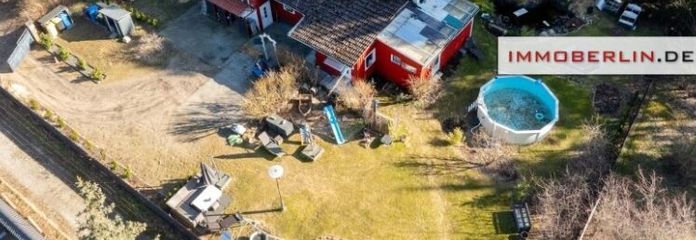 IMMOBERLIN.DE - Fabelhafter Bungalow mit Sonnengarten & Garage in waldreicher Umgebung
