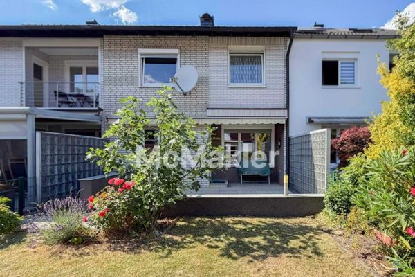 Well-maintained mid-terrace house with 5 rooms, garden and garage in Cologne-Pesch