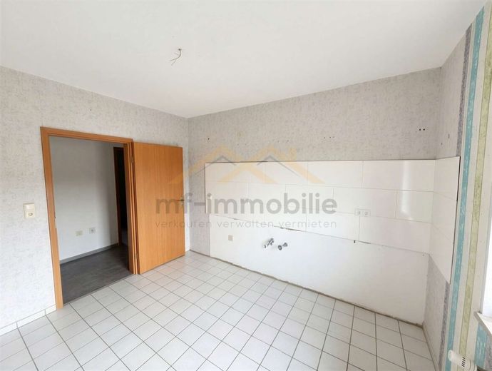 Wohnung in Grasleben ruhige Lage, Balkon, saniertes Badezimmer – Küche