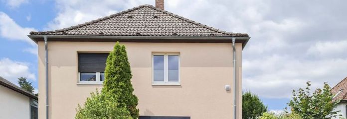 Charmantes Einfamilienhaus mit traumhafter Gartenidylle – Wohnen mit Charakter in gefragter Lage