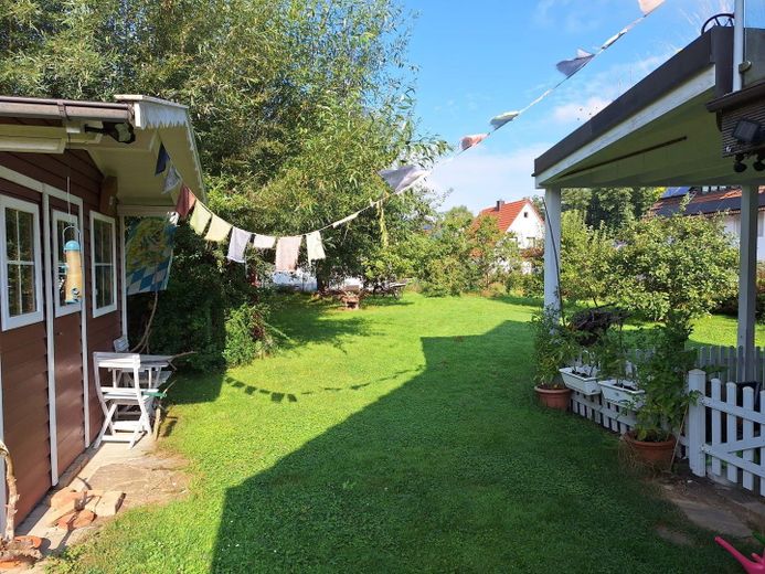 Carport mit Gartenhaus