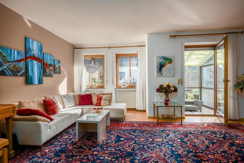 Wohnzimmer mit Wintergarten