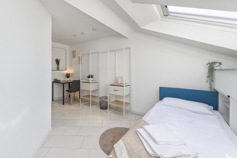 Charmante 4,5-Zimmer Dachgeschosswohnung – Schlafzimmer 2