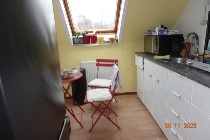 Charmantes Mehrfamilienhaus mit großem Garten in Traisa – Küche DG