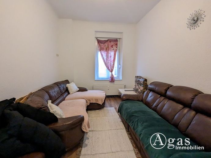 3-Zimmer-Erdgeschosswohnung mit Balkon und Keller in Eberswalde – Wohnzimmer