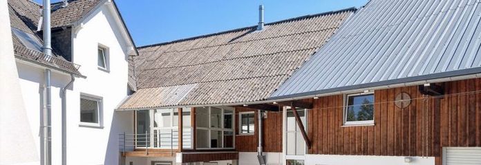 Zweifamilienhaus mit Gewerbe (KFZ Werkstatt)
