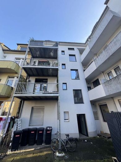 Defensiv im Risiko, offensiv in der Rendite - Top renoviertes MFH mit Arztpraxis und 12 Wohnungen – Rückansicht
