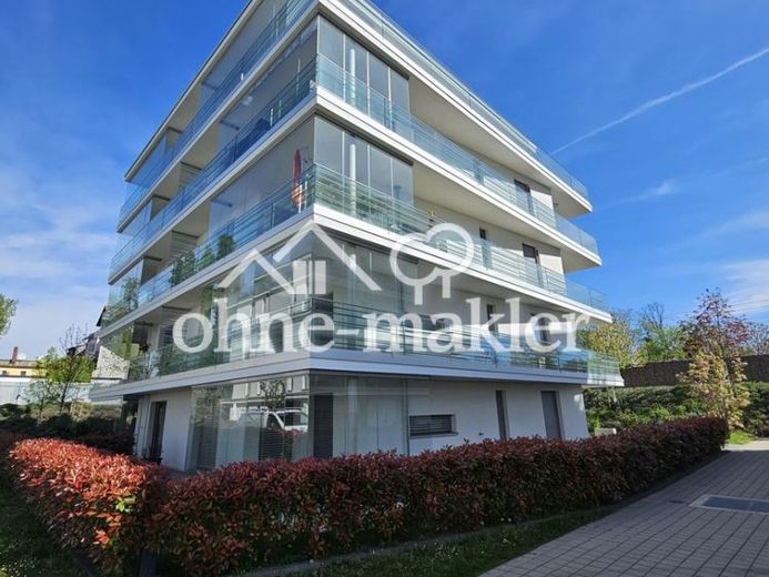 Wohnen wie im eigenen Haus – moderne Gartenwohnung am Altrhein mit Terrasse & Tiefgarage – Foto 1