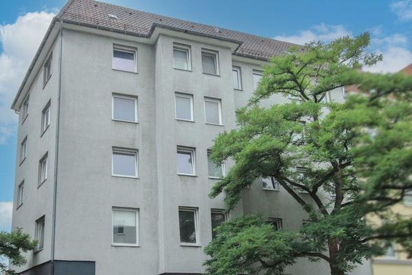Edificio residenziale e commerciale ben tenuto e completamente locato con 13 unità