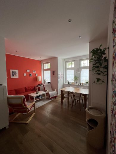 Vermietete 3 Zimmer Eigentumswohnung in Top Lage – Wohnzimmer